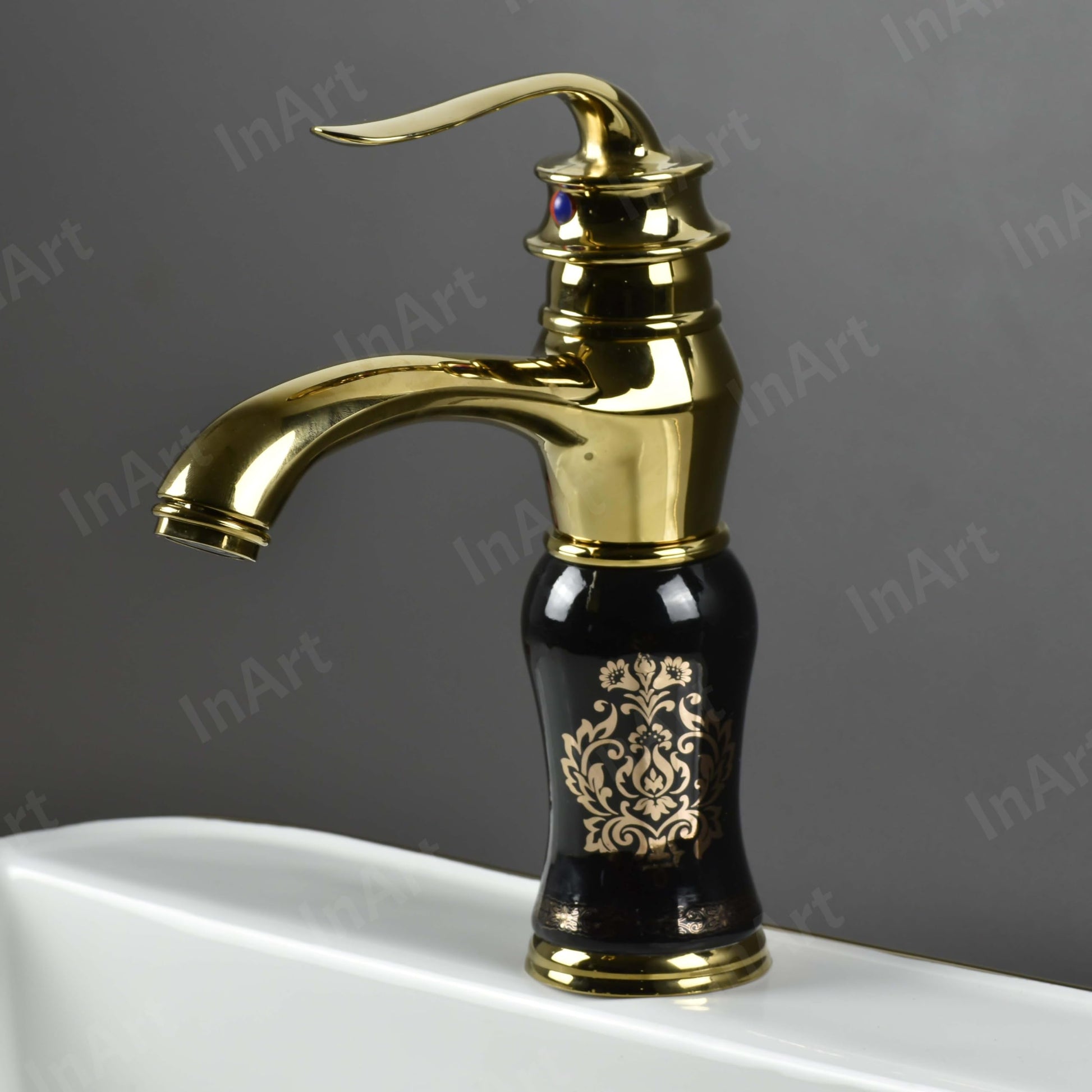 InArt bathroom wash basin mixer taps, side angle highlighting black gold glossy finish and hot and cold mixer
