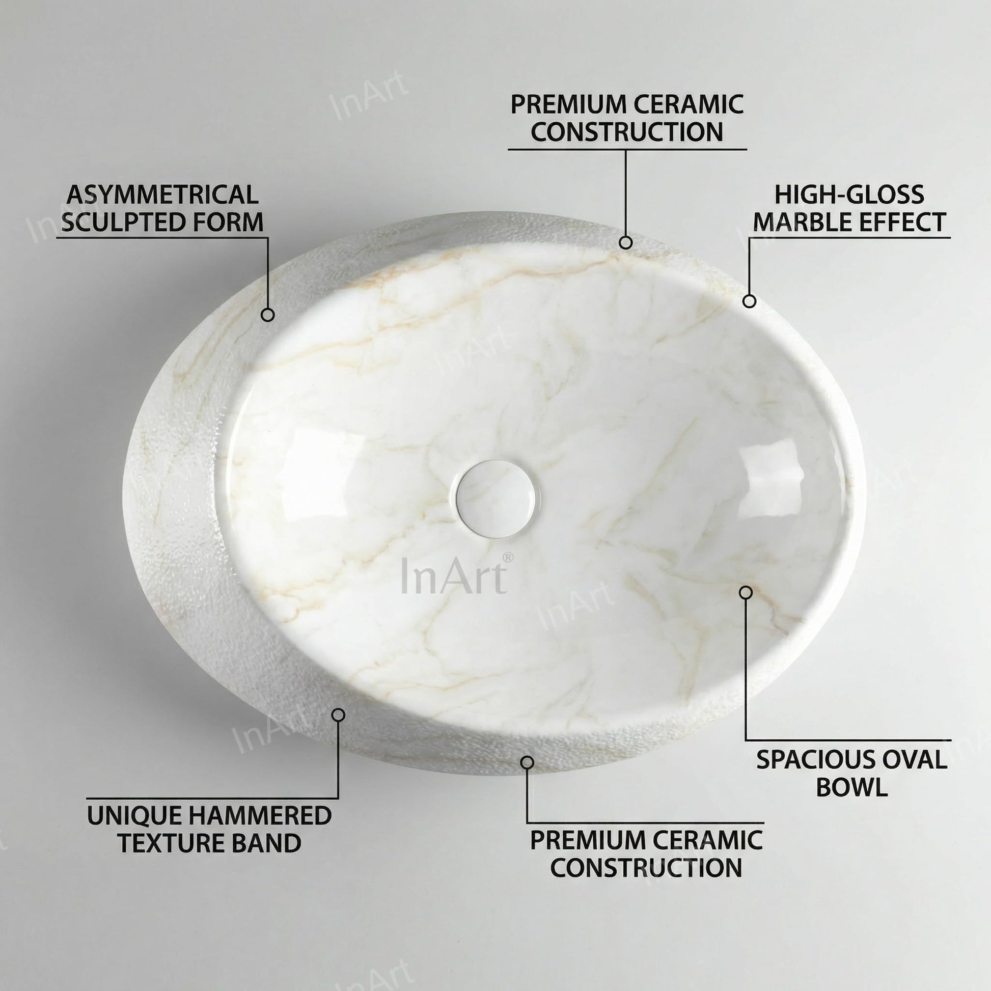 InArt ceramic table top wash basin in marble finish, oval designer basin angled side view for modern bathroom