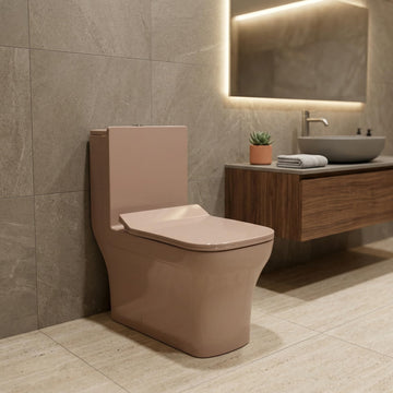 Cera single piece commode by InArt in pink ceramic rectangular one piece western toilet, front view