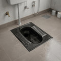 Side angle of floor mounted Orissa pan showing smooth ceramic finish