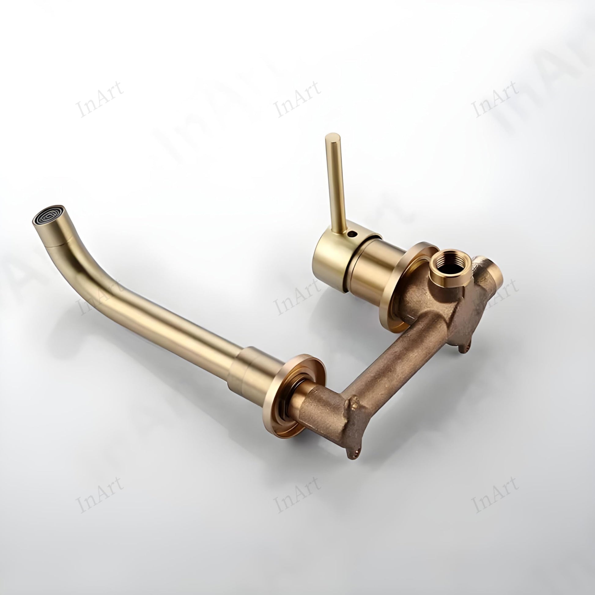 InArt wall mounted mixer tap with concealed parts, close-up of waterfall spout in brushed gold brass