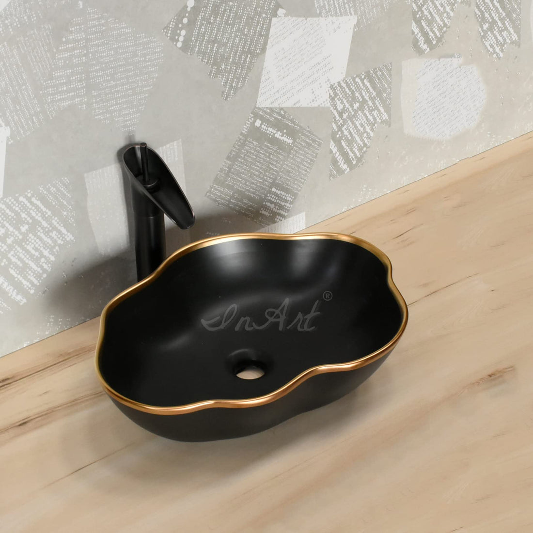 InArt ceramic table top wash basin, rectangular matte black with gold counter top basin, main front view