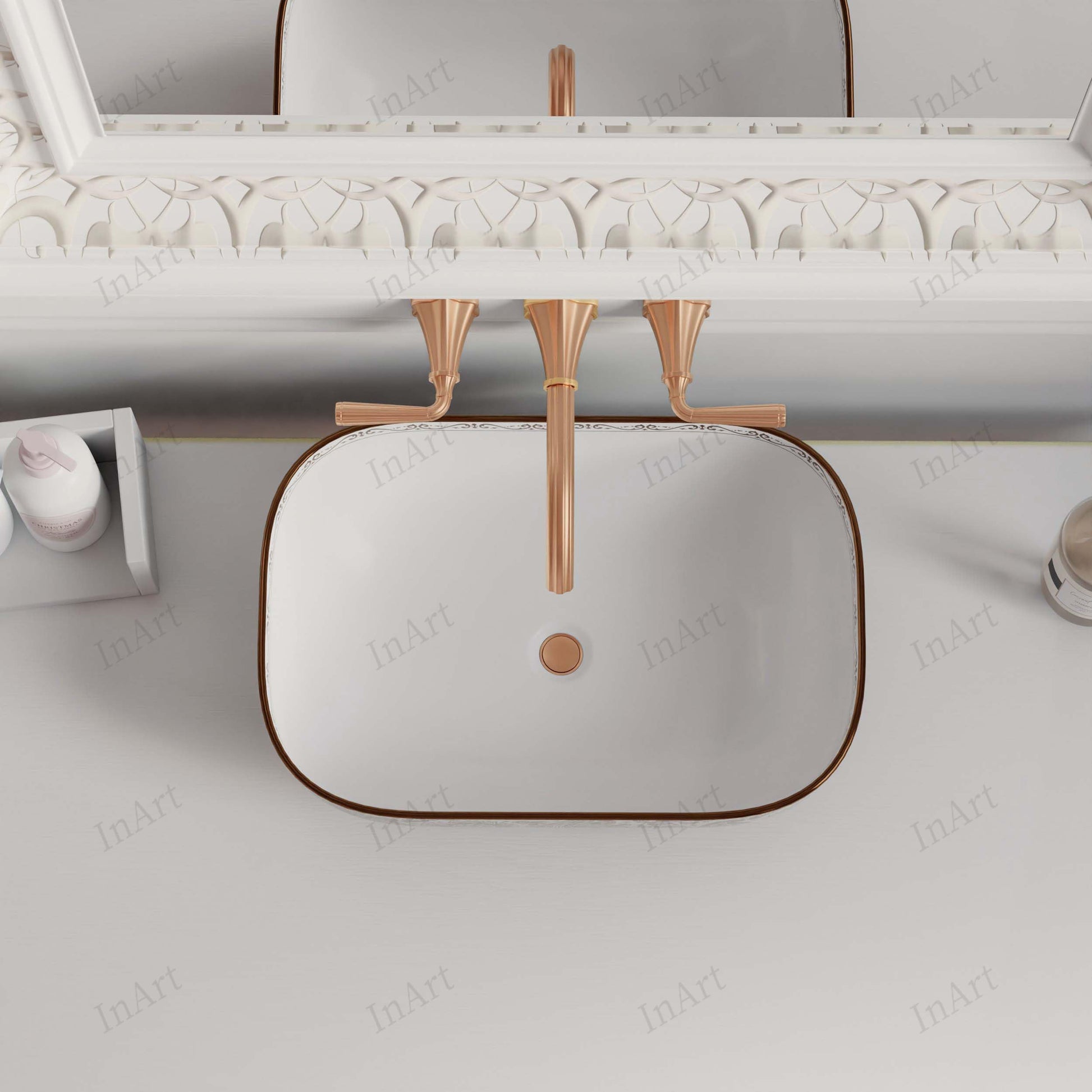 InArt table top wash basin in bathroom interior, rose gold rectangular ceramic basin on counter with tap