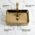 Rose gold table top basin design in ceramic, rectangular modern wash basin shown at 3/4 angle