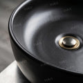 Over counter ceramic wash basin in matte black for washroom vanity