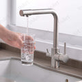 InArt swan neck kitchen tap with dual lever mixer, brushed chrome brass body and curved spout detail