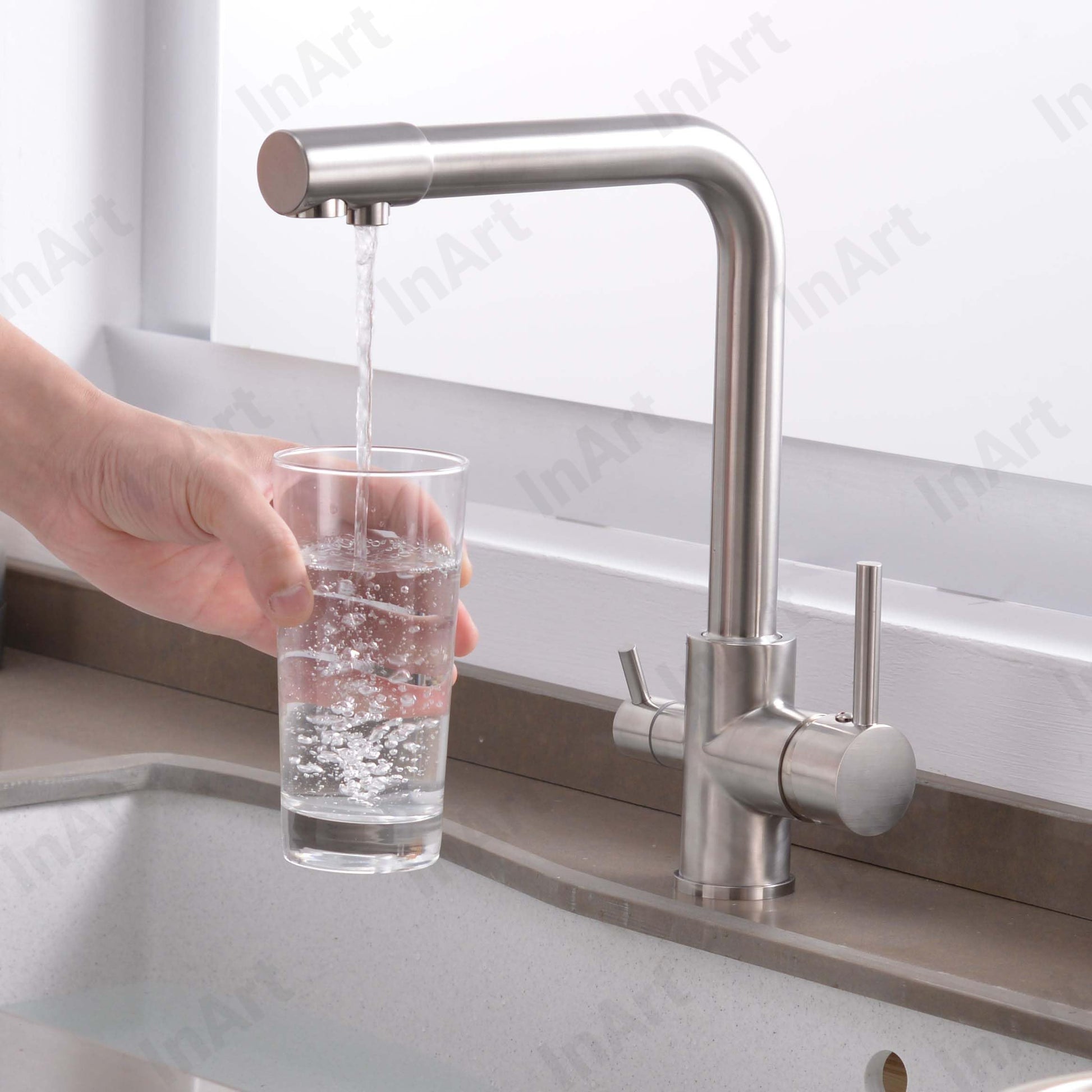 InArt swan neck kitchen tap with dual lever mixer, brushed chrome brass body and curved spout detail