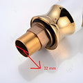 Brass basin tap with hot and cold water, deck mount wash basin mixer tap in luxury gold finish, handle detail
