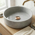 InArt bathroom sink pop up waste coupling close-up, corrosion resistant brass with glossy rose gold finish