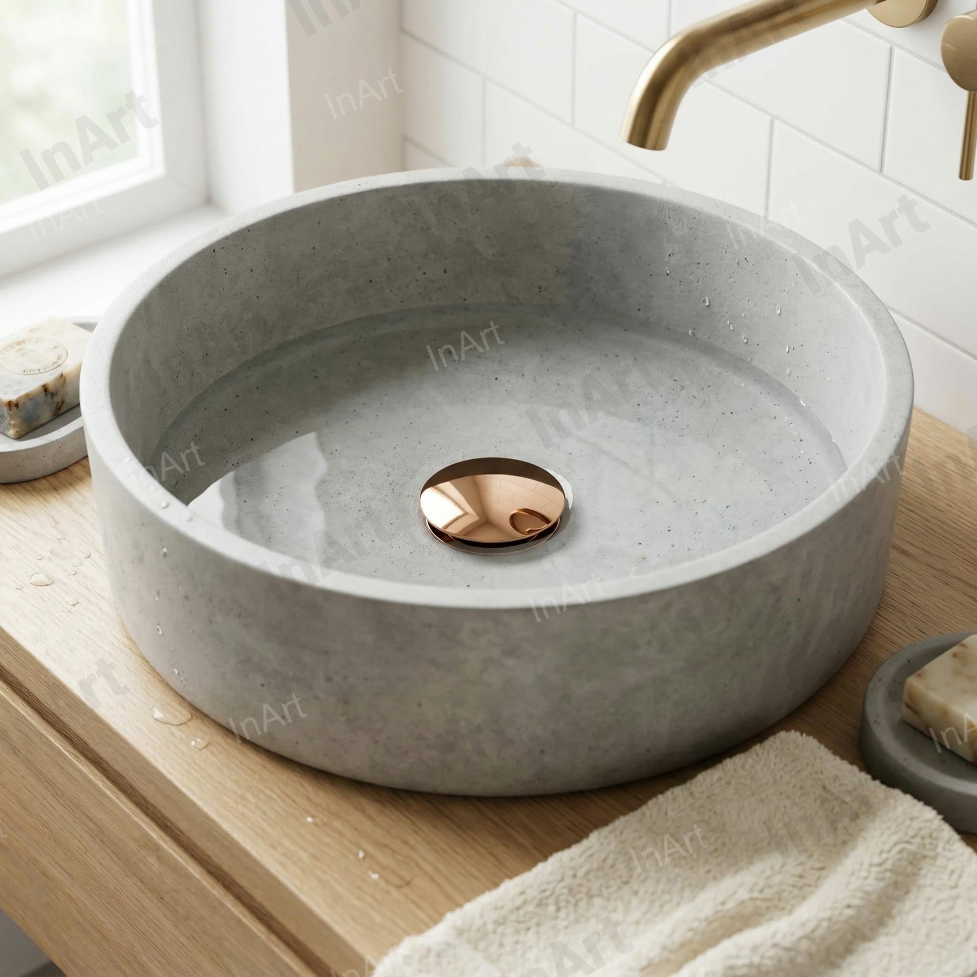 InArt bathroom sink pop up waste coupling close-up, corrosion resistant brass with glossy rose gold finish