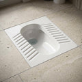 Ceramic squat pan glossy white finish, close-up of rim and water channel for easy cleaning