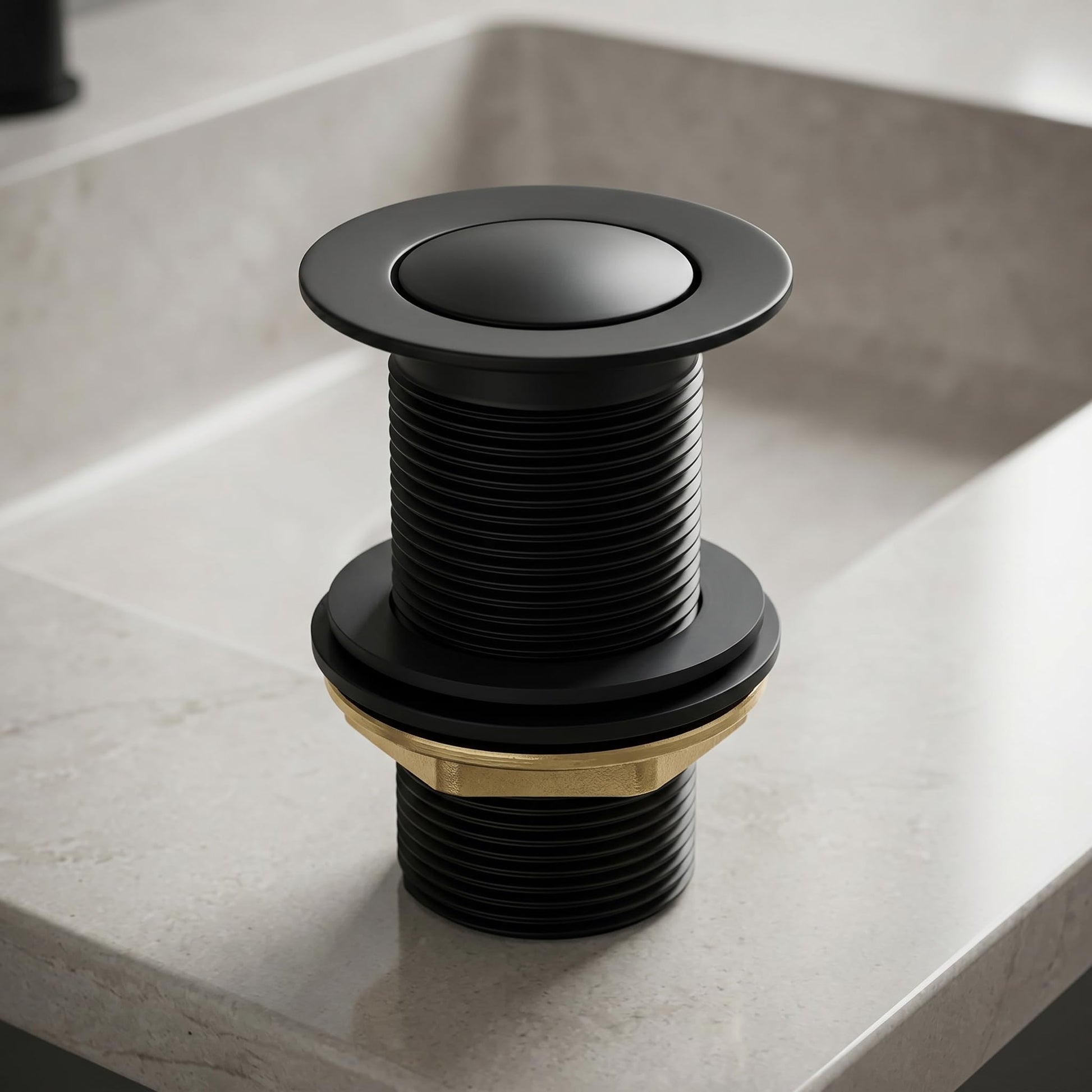 Matt black pop-up waste coupling for wash basin with half-cap top view
