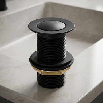 Matt black pop-up waste coupling for wash basin with half-cap top view