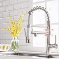 Kitchen sink mixer tap installed on countertop, pull-down sprayer for easy cleaning and rinsing