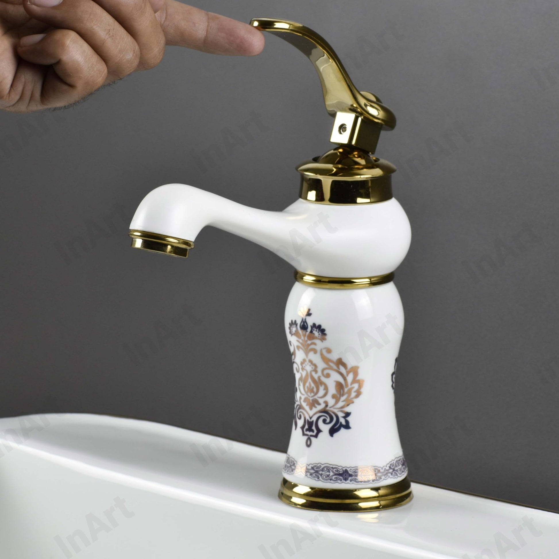 InArt mixer wash basin tap installed on wash basin, modern bathroom interior look with waterfall flow design