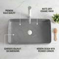 Matt grey table top basin design in ceramic, rectangular top counter wash basin, angled view
