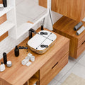 InArt table top wash basin counter design, gold ceramic rectangular basin close-up of glossy finish