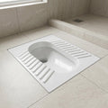 Close-up of white glazed ceramic finish on Orissa pan for easy cleaning