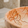 Close-up of ceramic wash basin surface with easy-clean glazed finish