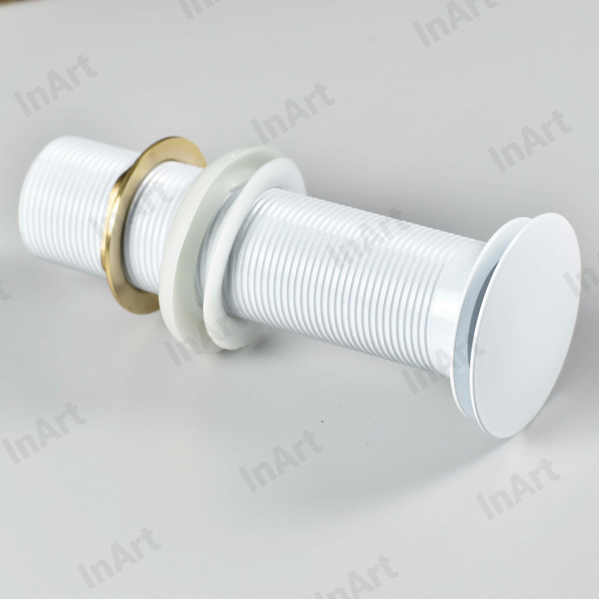 InArt wash basin pop up waste coupling 32 mm, glossy white brass drain plug stopper, angled view