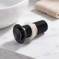 Press-to-open and press-to-close pop-up drain mechanism for wash basin
