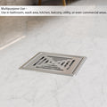 Close-up of slotted stainless steel drain jali with brushed matte finish for Indian bathroom floor