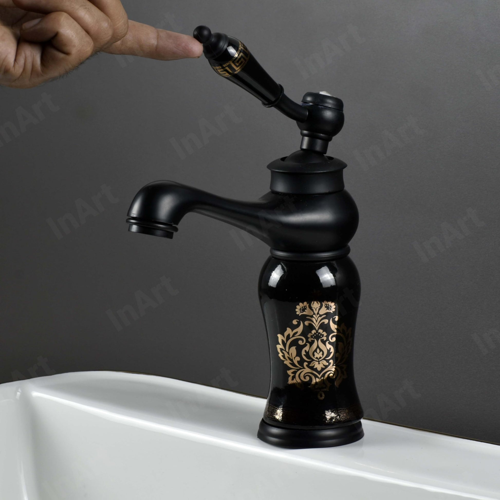 InArt black basin tap for wash basin, single lever basin mixer installed on countertop for modern bathroom