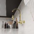 Kitchen sink pull out tap, angled view of brushed gold brass mixer with hot and cold lever control