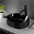 InArt modern table top wash basin in glossy black ceramic, oval bathroom sink table top, side angle
