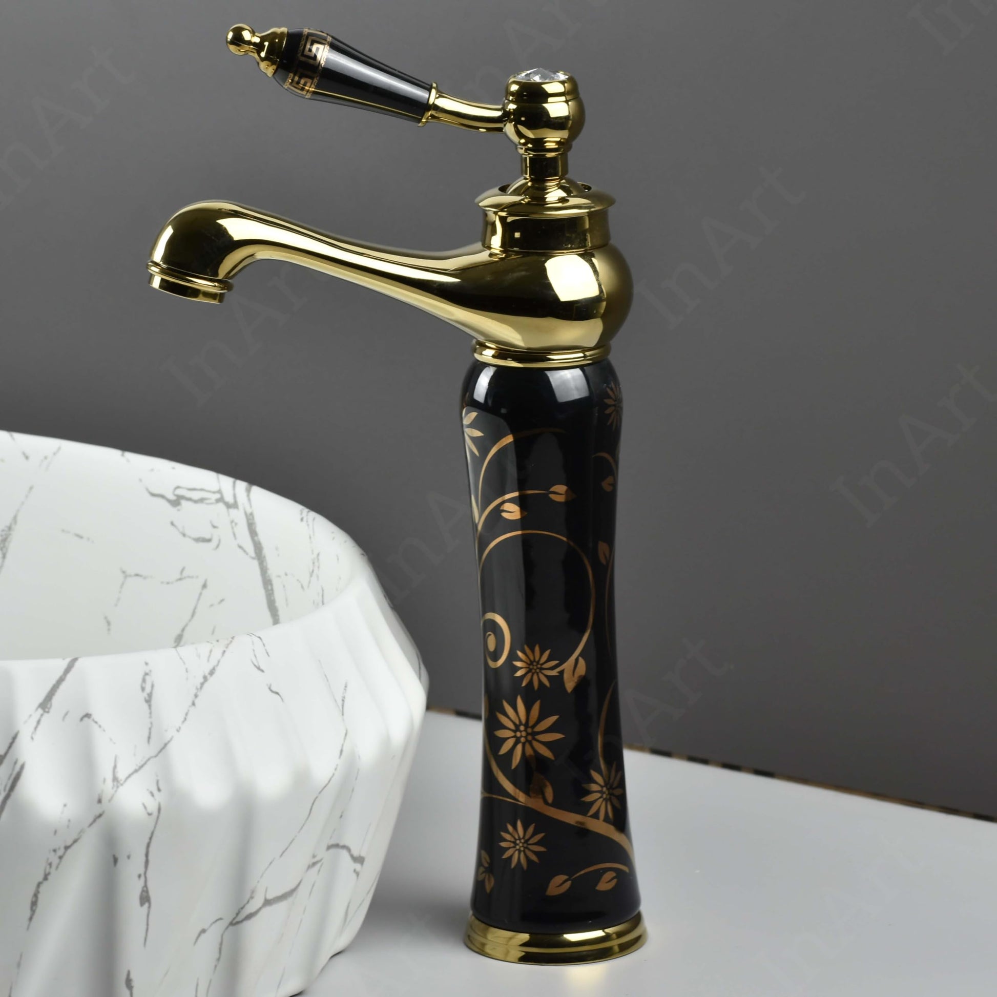 InArt single hole basin mixer with ceramic disc cartridge, close-up of single lever and waterfall outlet