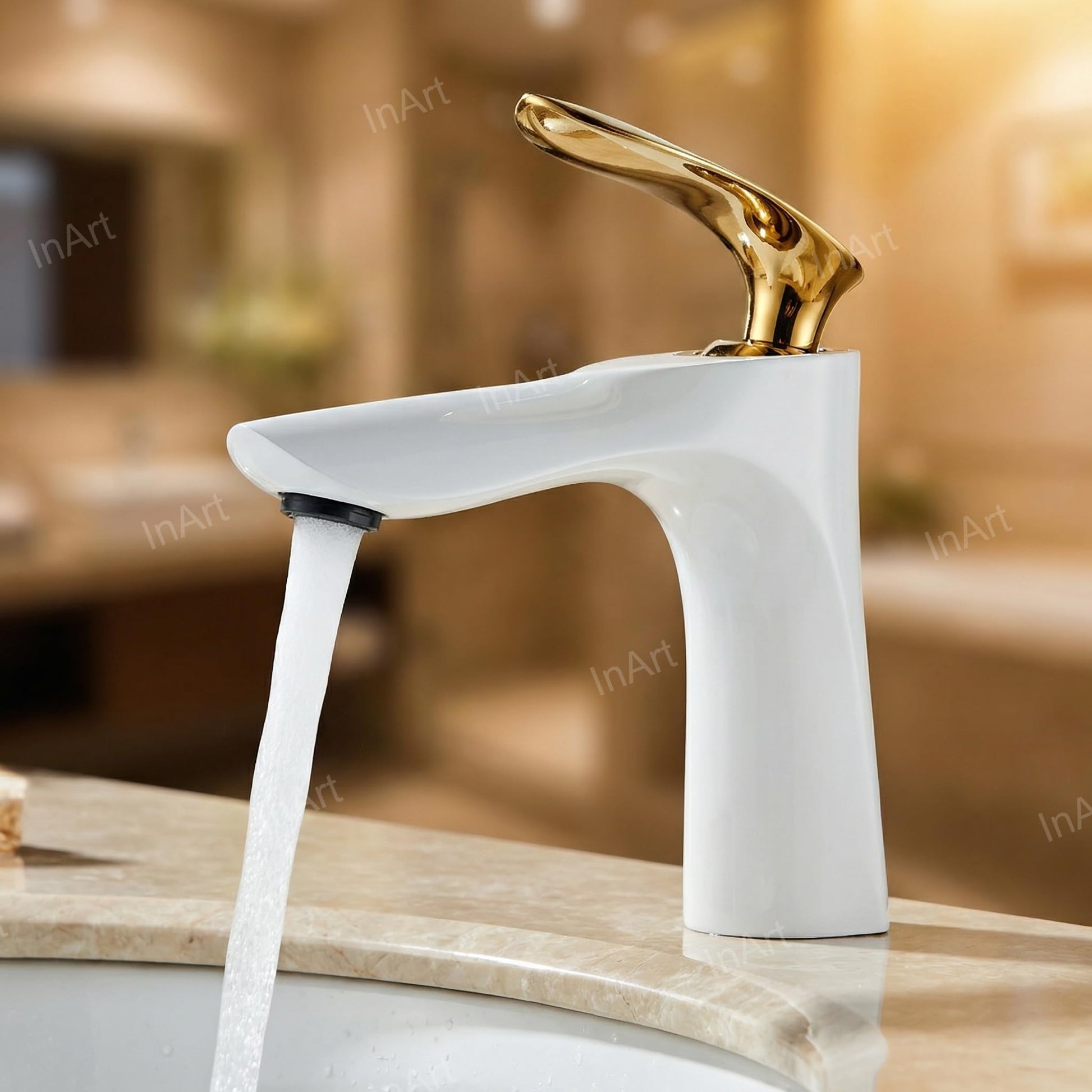 Detail of spout and aerator on brass wash basin mixer tap in golden white finish