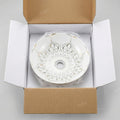 InArt ceramic table top wash basin in bathroom interior, white and gold round basin on table with wash basin
