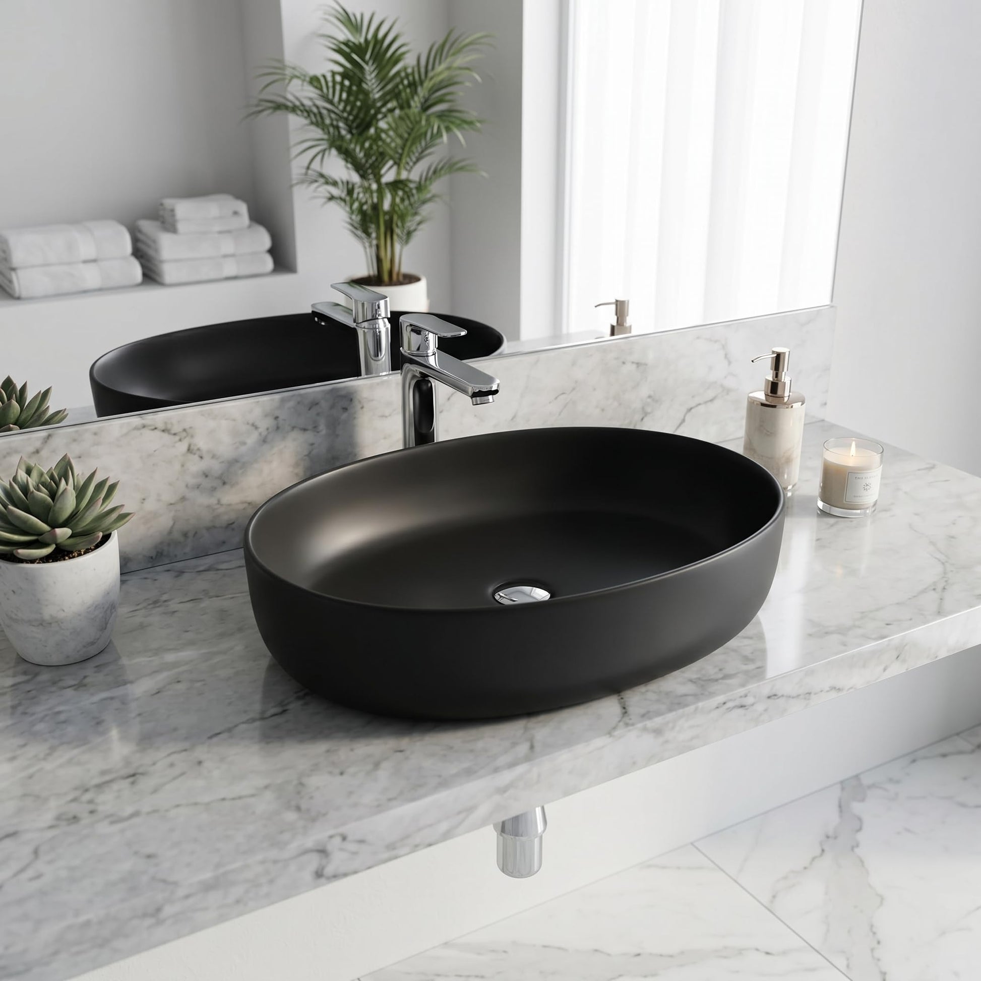 Matte black oval ceramic table top wash basin above counter view