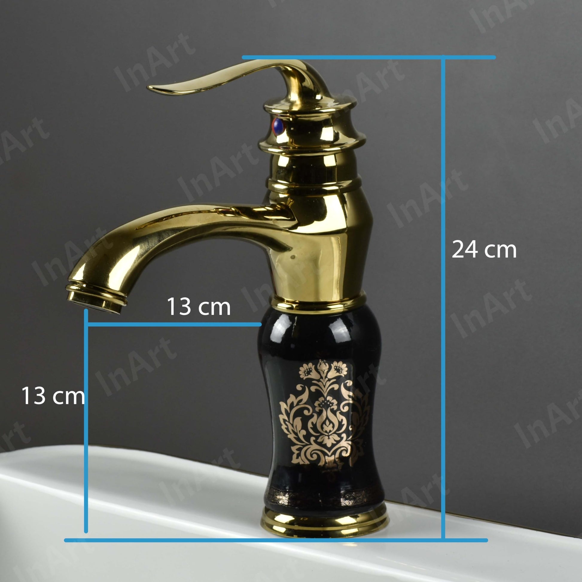 Black gold basin mixer tap for wash basin, angled view showing waterfall spout and single handle deck mount