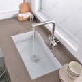 InArt brass kitchen sink faucet with 3-way water filter outlet, dual lever controls close-up detail