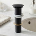 InArt wash basin pop up in matte black brass, round 32mm full threaded waste coupling for table top basins