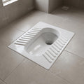 InArt indian toilet pan for bathroom, glossy white ceramic sanitaryware with anti-slip foot area