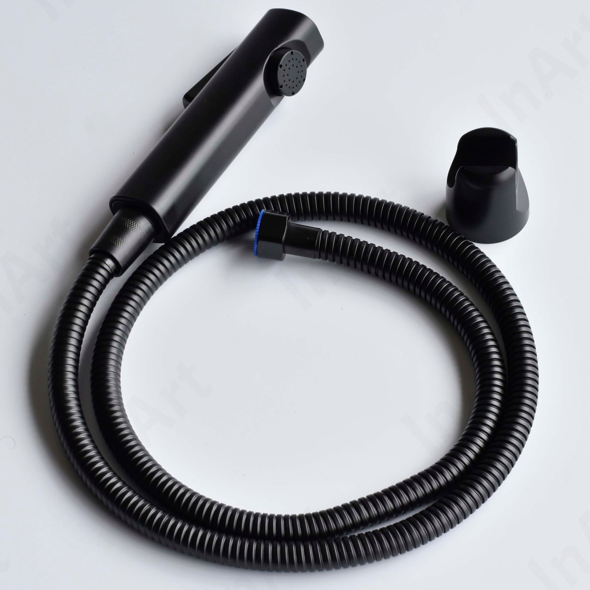 Close-up of InArt matte black health faucet gun lever, ABS bidet spray head for bathroom hygiene