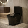 Soft close toilet seat detail on InArt one piece commode, durable ceramic western toilet in white finish
