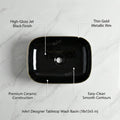 InArt designer ceramic wash basin in glossy black gold, rectangular table top basin, 3/4 angle view