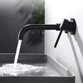 InArt single lever basin mixer wall mounted with concealed parts, close-up of brass body in matte black