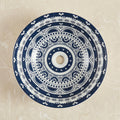 InArt table top basin design in glossy blue ceramic, angled view for modern bathroom washroom