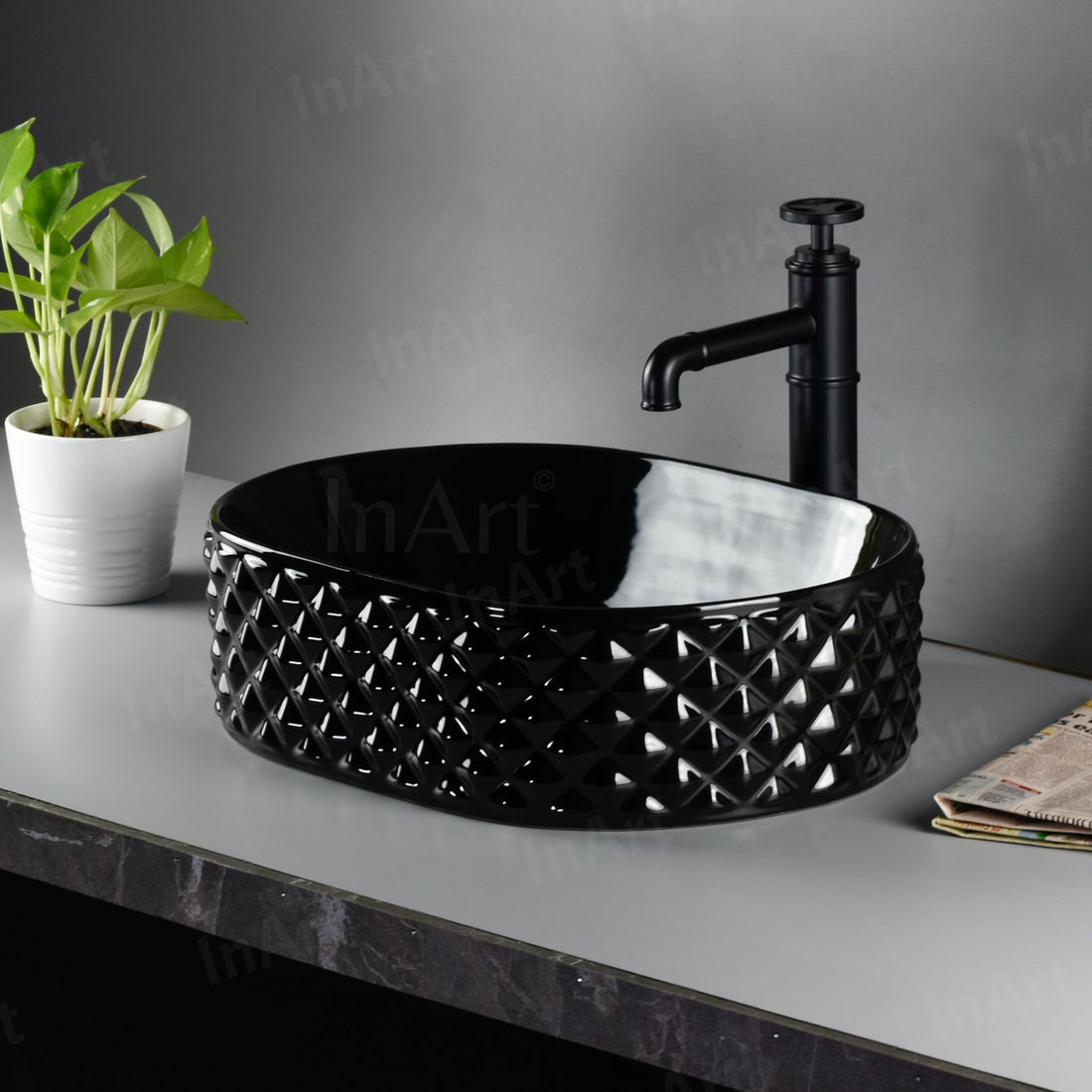 InArt small table top wash basin, glossy black oval ceramic countertop sink, main front view