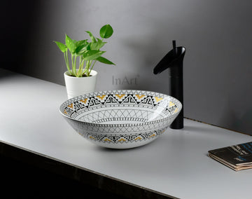 InArt hindware table top wash basin in round glossy ceramic with yellow Mexican pattern, front view
