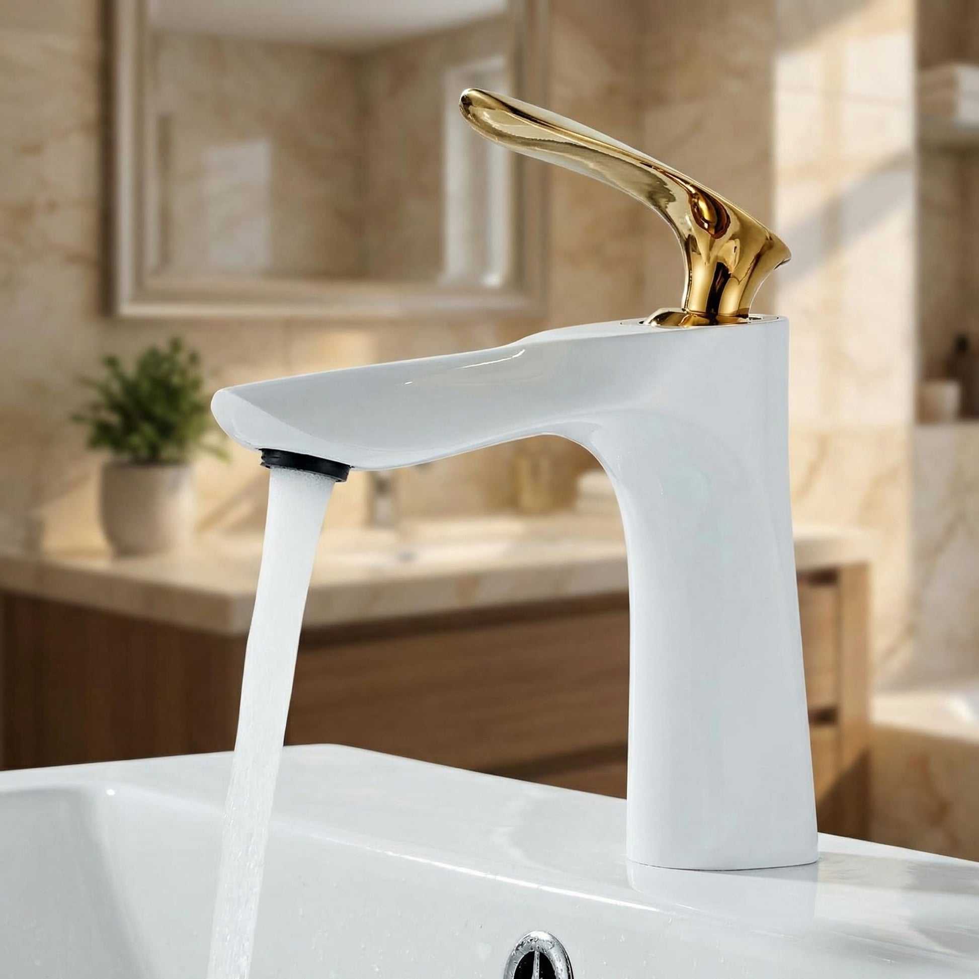 InArt basin mixer tap close-up of single lever handle and smooth golden white coating
