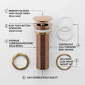 Designer wash basin waste coupling rose gold, angled view of round brass pop-up basin drainer