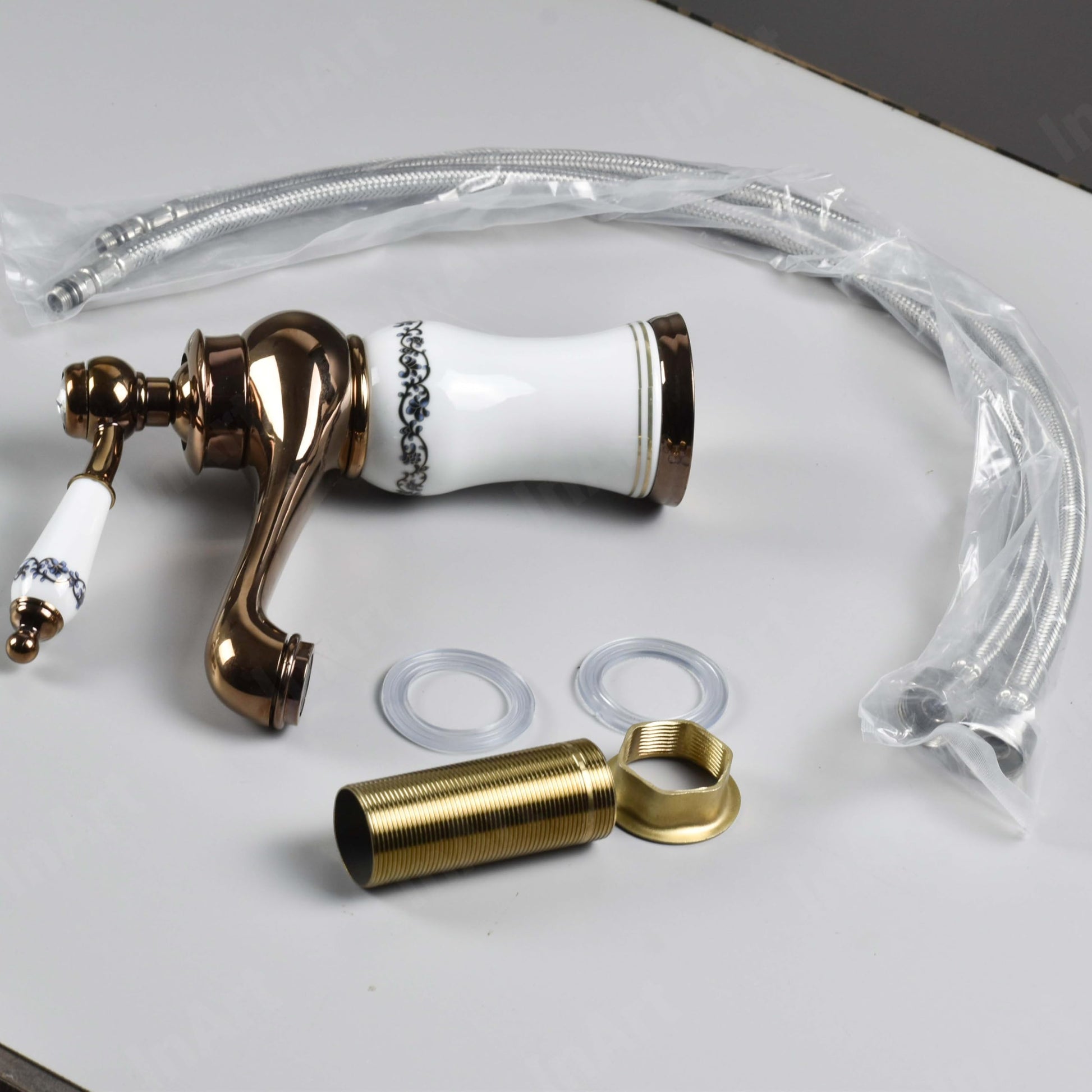 Deck mount wash basin mixer single lever tap in rose gold, zinc body, modern washroom basin fitting