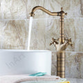 Close-up of InArt deck mounted basin mixer tap showing lever handle and premium brass antique oil rubbed finish