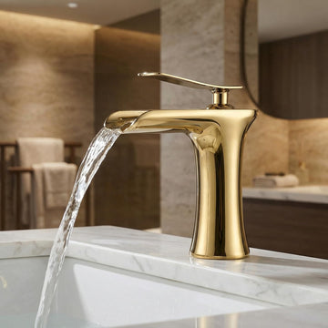InArt single lever basin mixer in golden brass with waterfall spout, front view bathroom tap