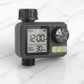 Automatic water tap timer installed on garden tap with hose connection